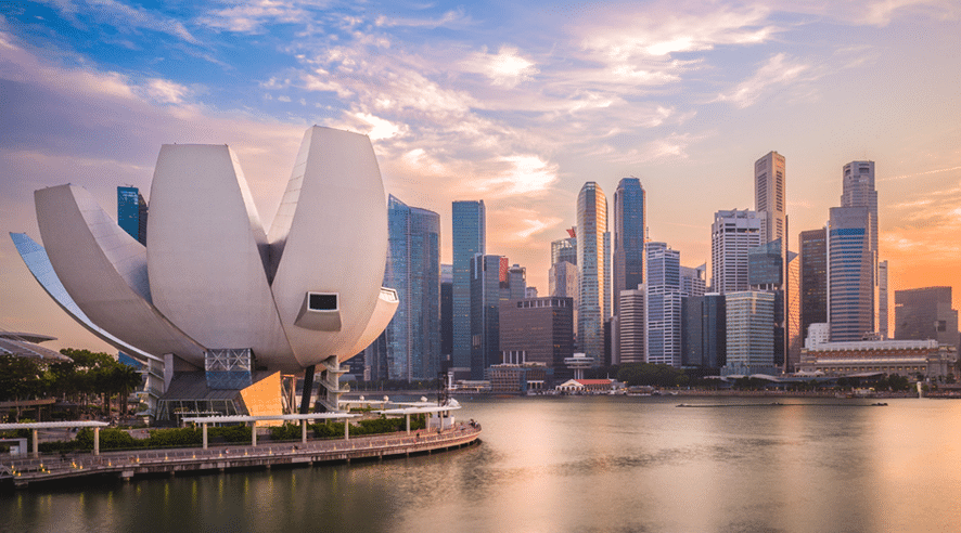 Scenic view of Singapore's Marina Bay skyline at sunset, highlighting the convenience and trustworthiness of Elite Investment & Credit, a legal money lender based in Singapore.