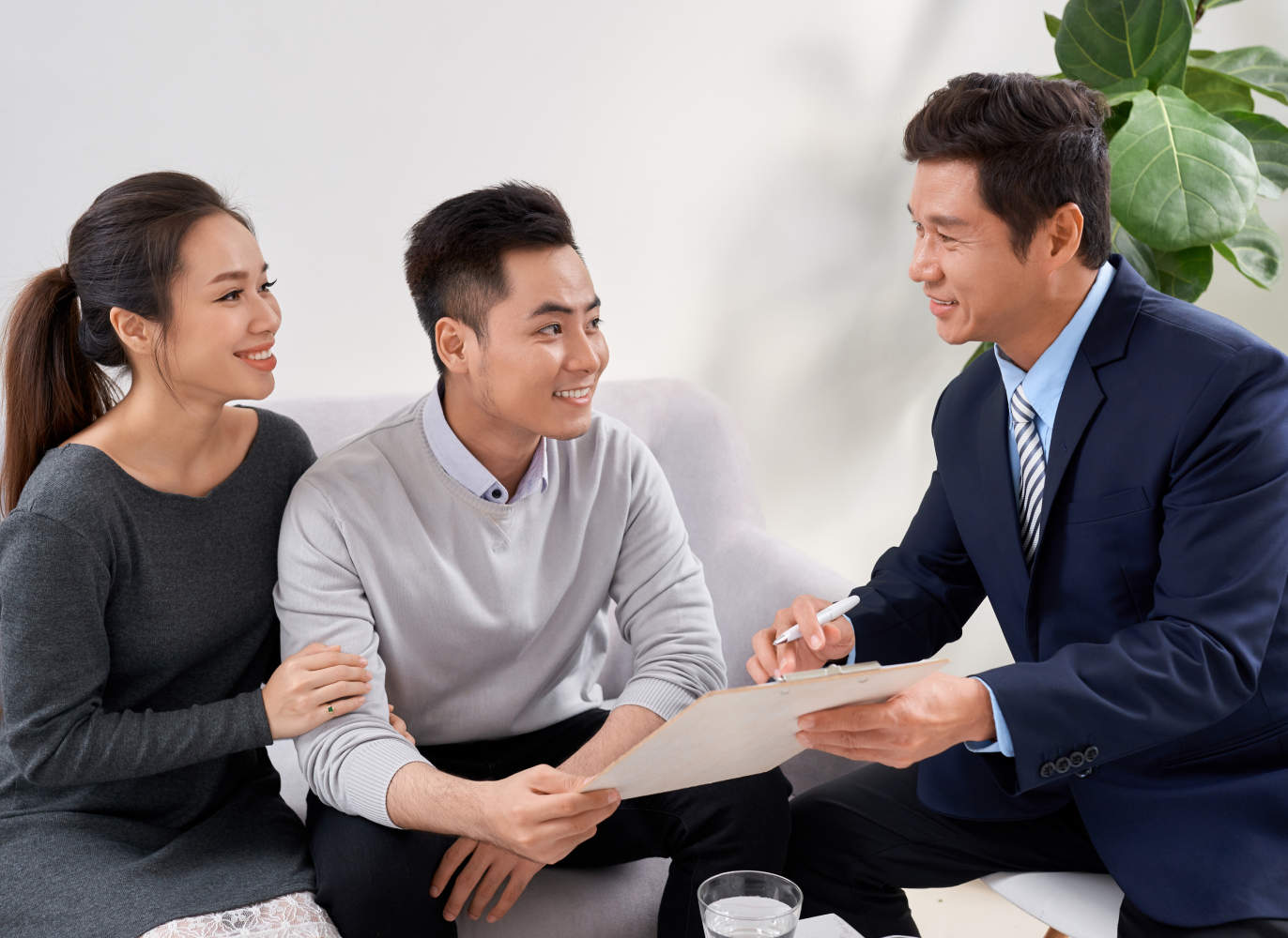 happy couple meeting with the legal and authorised money lender in Singapore