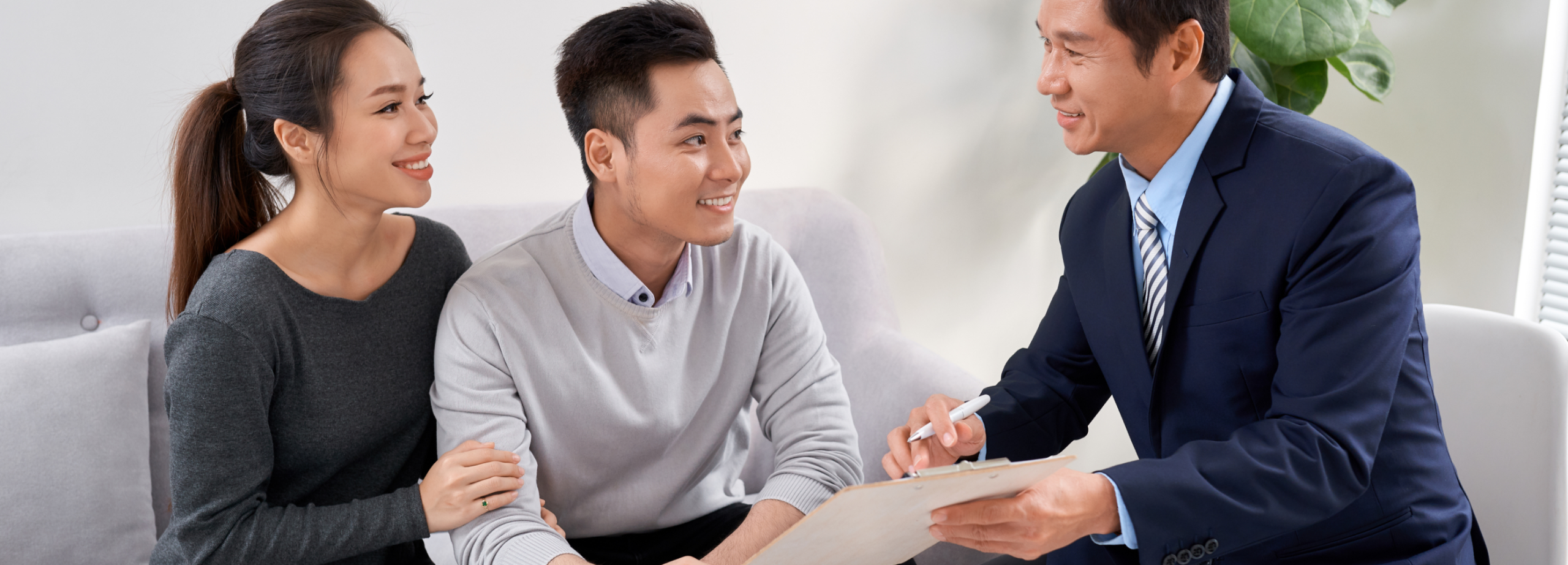 happy couple meeting with the legal and authorised money lender in Singapore